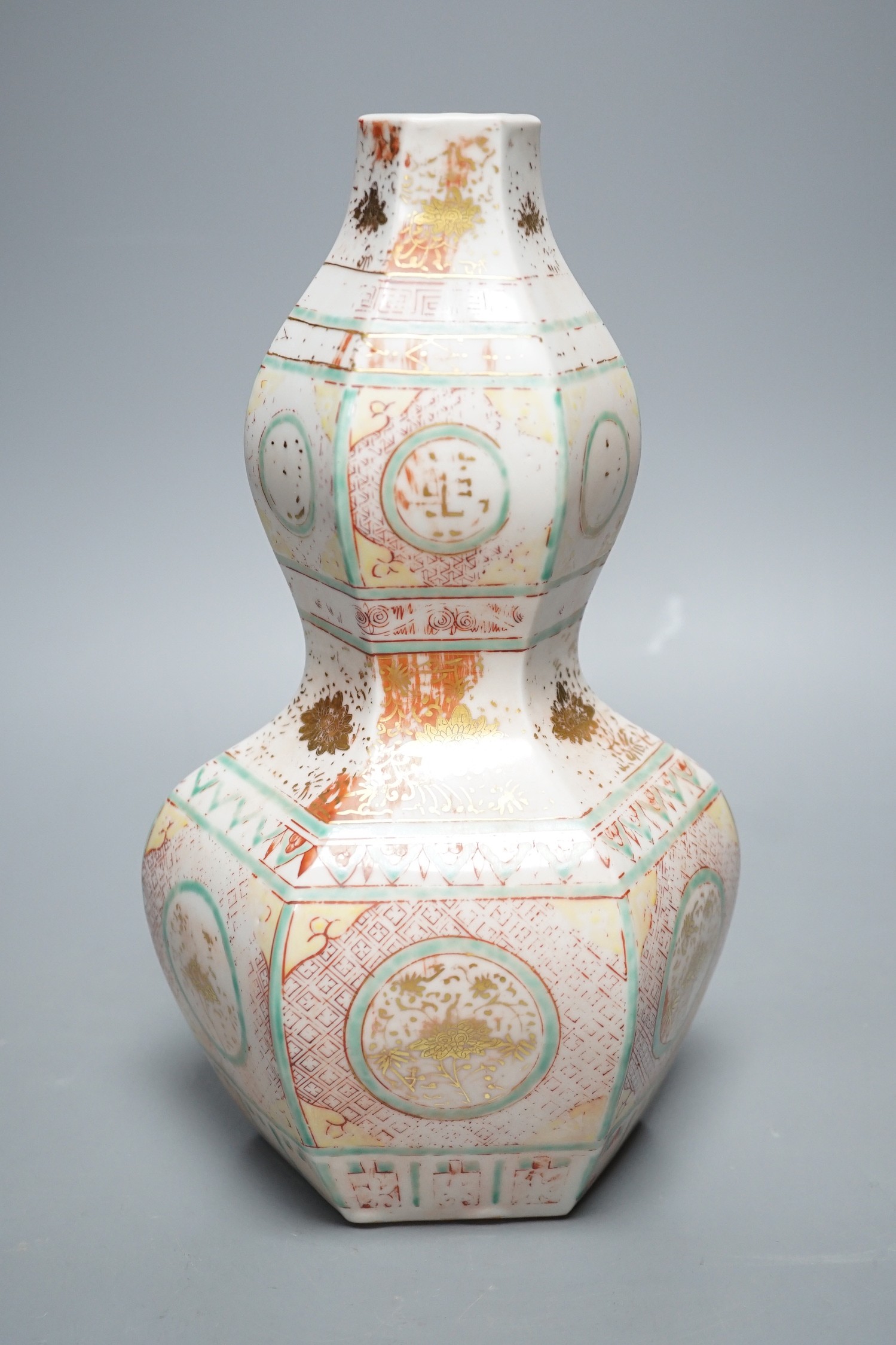 A Chinese famille rose gourd hexagonal shaped vase, Ming style, 28cm tall